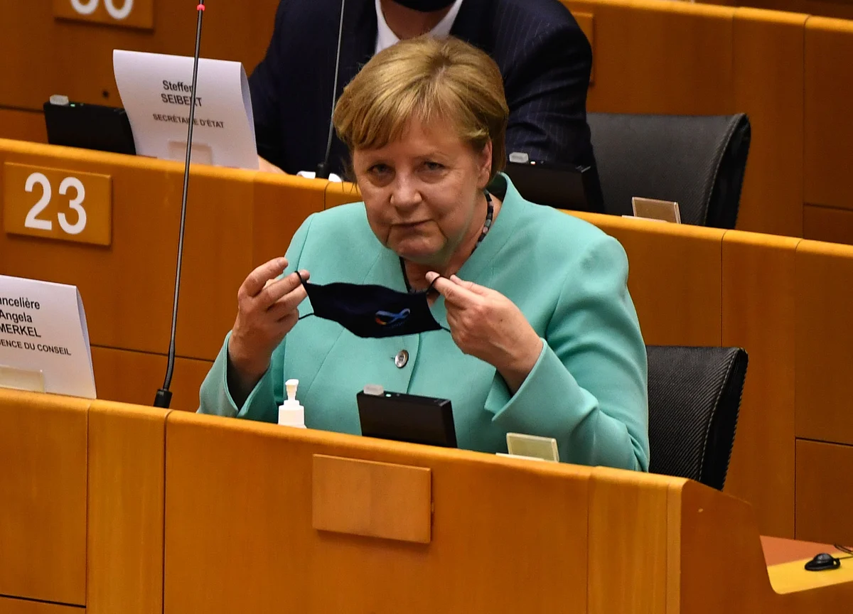 Merkel Warns Virus Spike Leaves No Room to Ease Restrictions
