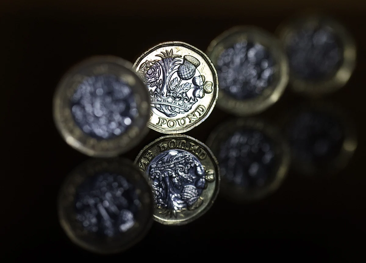 Pound Drops After Surge In Virus Cases Revives Risk Of Lockdown