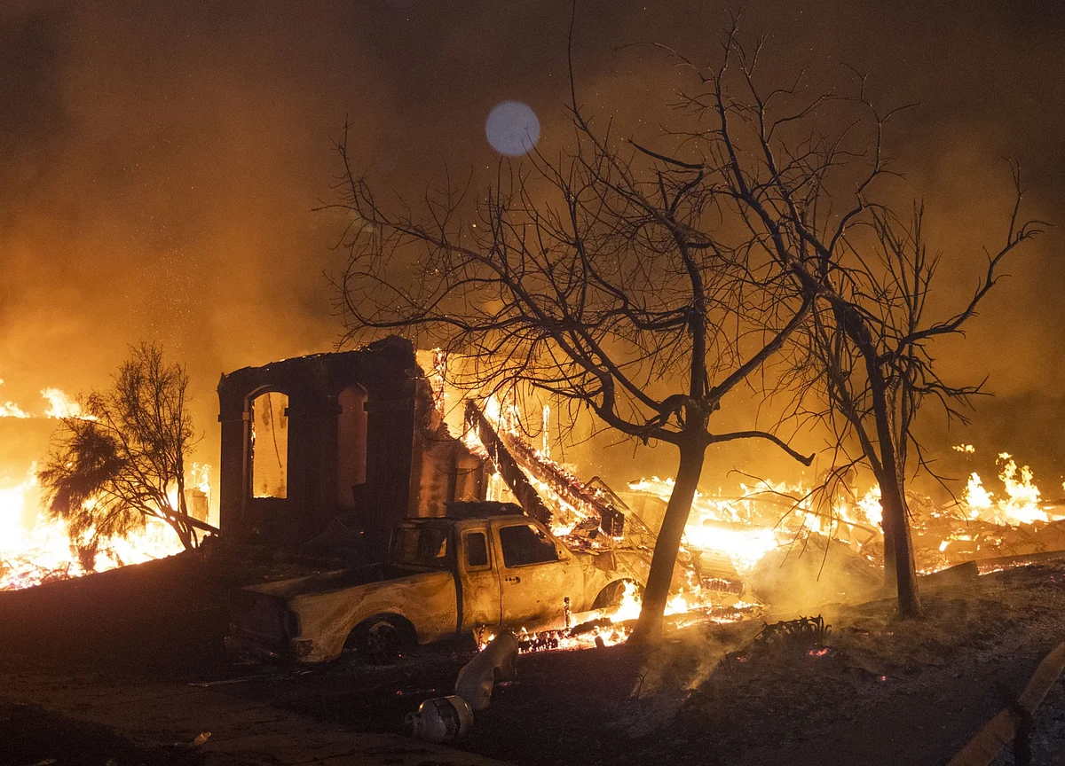 Fire, Snow, Hurricane Striking U.S. in Clash of Seasons