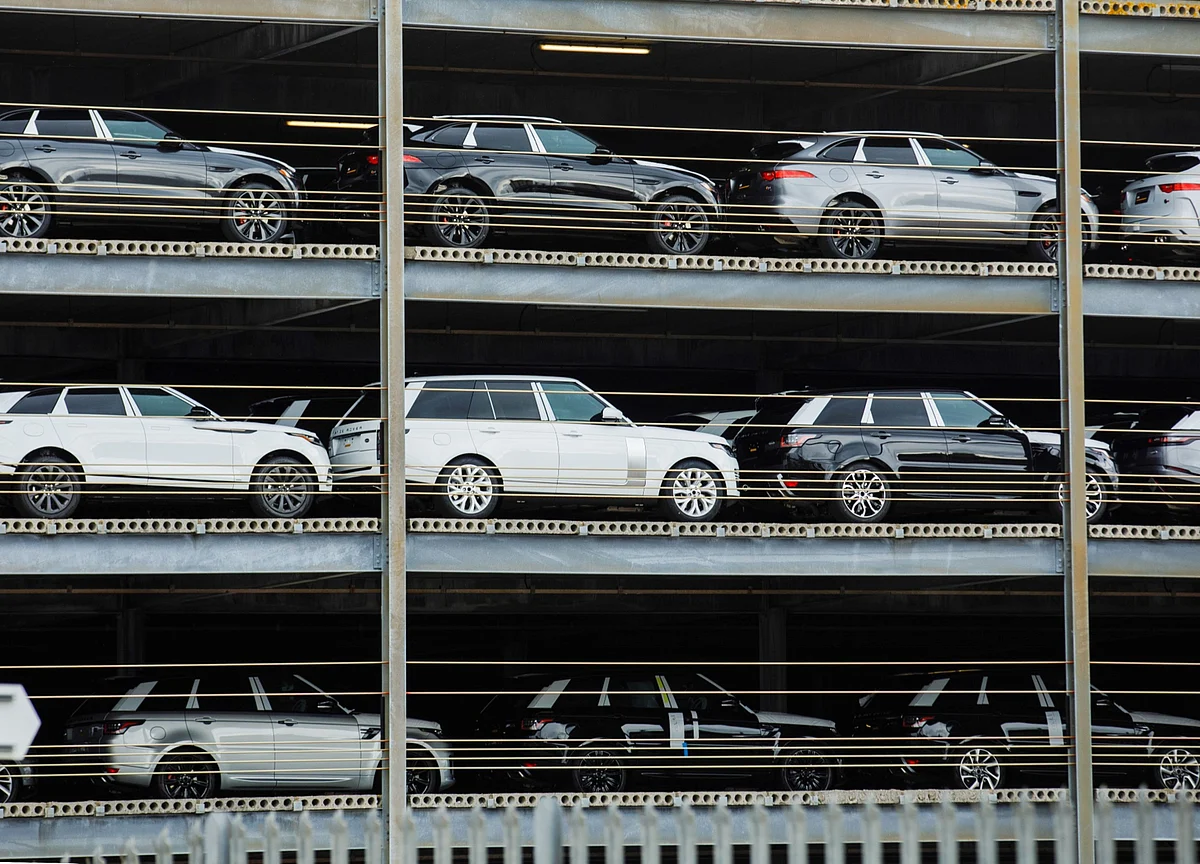 Jaguar Land Rover Raises More Cash Than Planned But Pays the Price