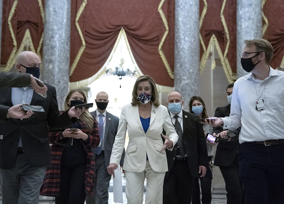 Pelosi Cites Fed Chair’s Warning to Prod GOP on Bigger Stimulus
