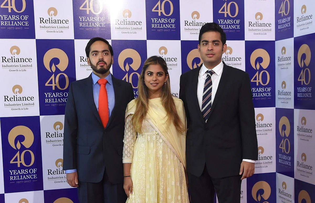 Anant, left, Isha, middle, and Akash Ambani. (Photographer: Sujit Jaiswal/ AFP) 