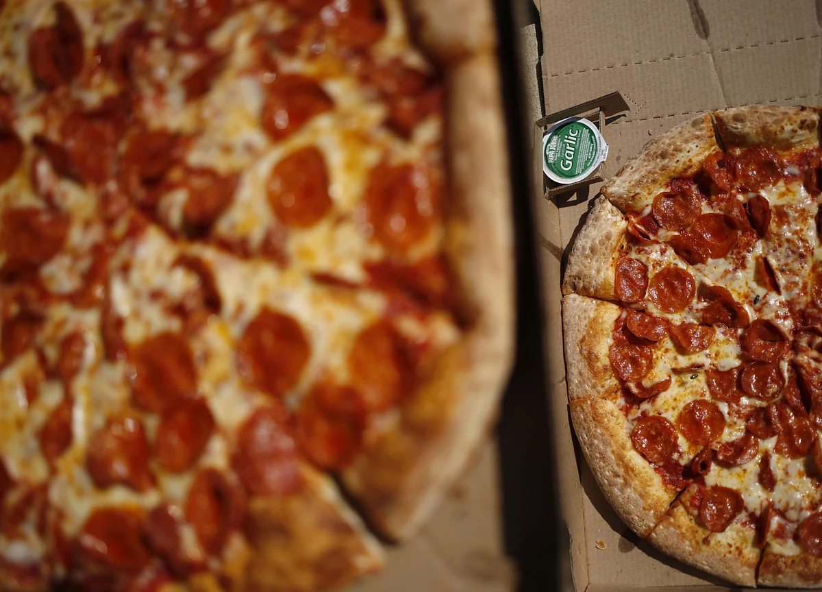Papa John’s Sales Spike as Nervous Americans Gorge on Pizza