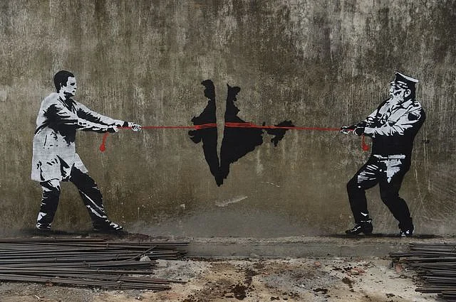 Wall graffiti in Mumbai, 2019. (Photo: Indranil Mukherjee/AFP via Getty Images)
