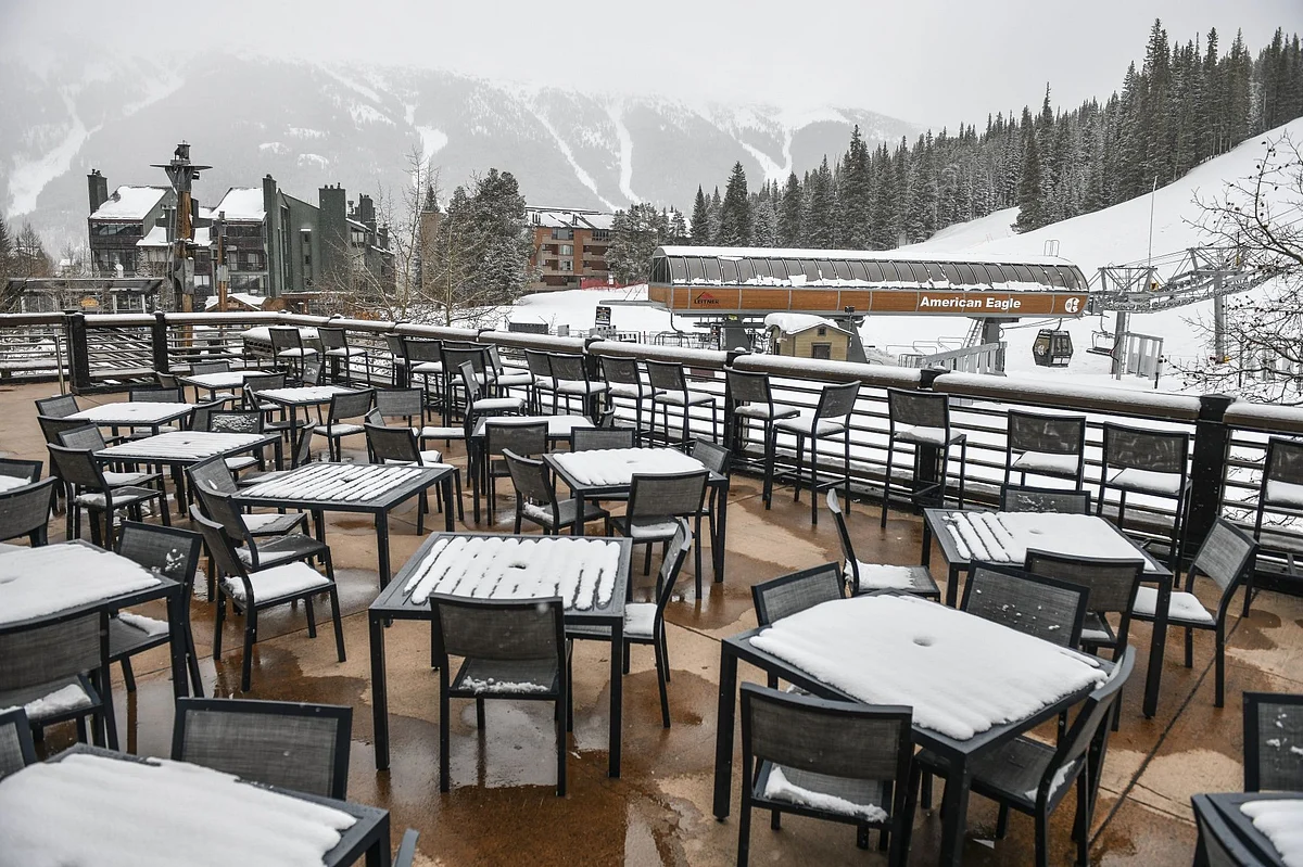 All of the tables are empty at Copper Mountain in Frisco, Colorado, on March 19 after state officials ordered ski areas to close. Photographer: Michael Ciaglo/Bloomberg
