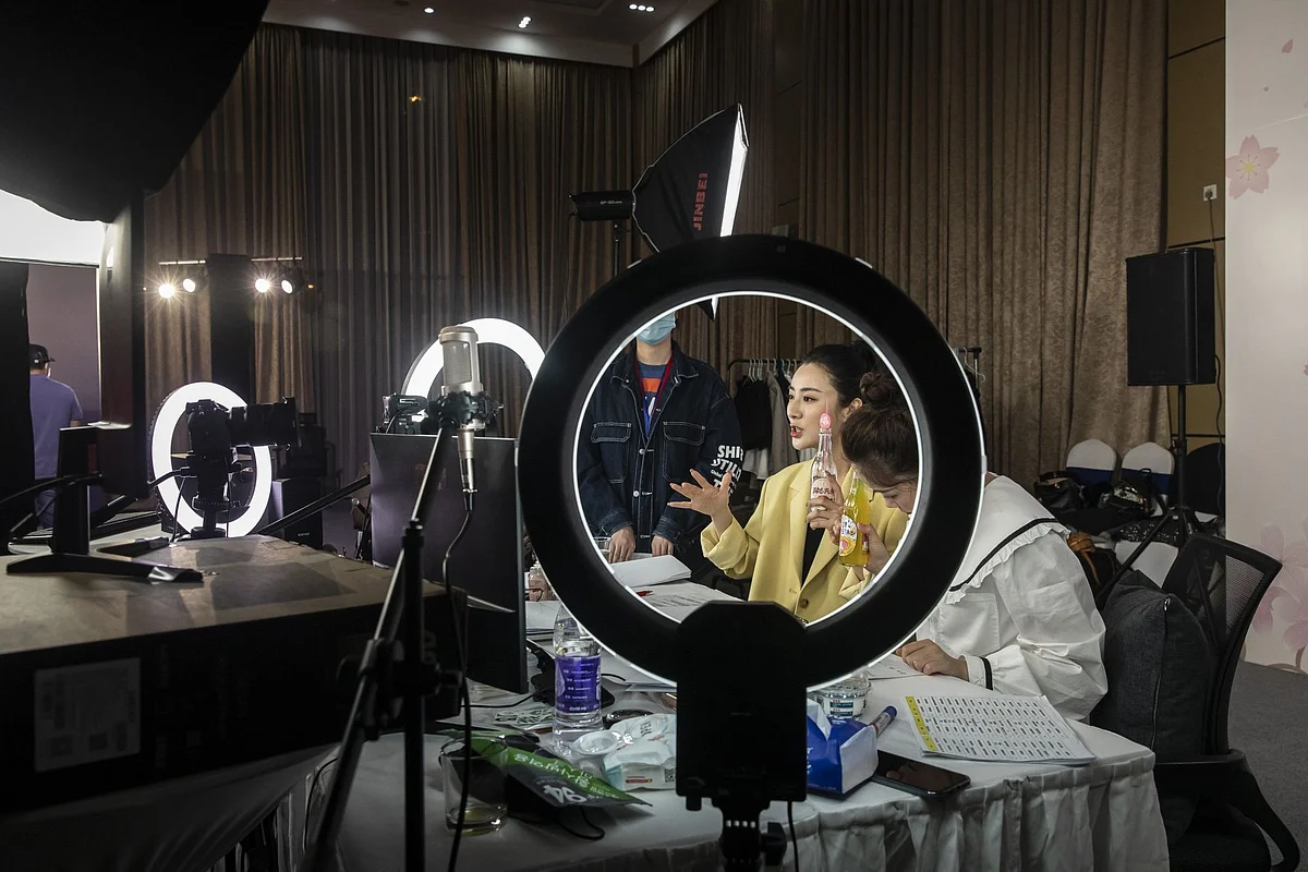 Livestreamer Huang Wei, known professionally as Viya, does a special event in Wuhan, China, on April 30. By the time Europe and the U.S. were being overwhelmed with infections, China was starting to emerge from its Covid-19 shutdowns. Photographer: Qilai Shen/Bloomberg 