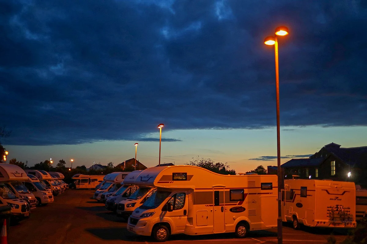 Motor homes provide temporary accommodations for medical staff in Blackburn, England, on May 14. Photographer: Hannah McKay/Reuters/Bloomberg 