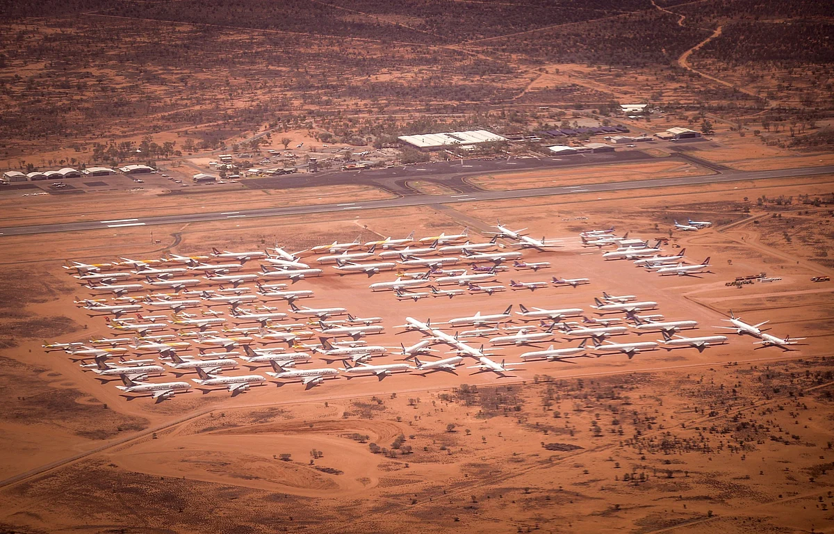 Commercial planes are stored at a remote airstrip in Alice Springs, Australia, on Oct. 23. The coronavirus pandemic and the related collapse in demand has had a catastrophic effect on the airline industry. Photographer: David Gray/Bloomberg