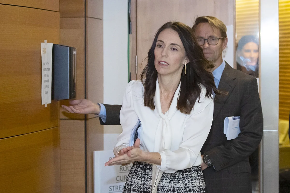 New Zealand Prime Minister Jacinda Ardern applies hand sanitizer before a news conference in Wellington on April 20. She won global praise for her handling of the crisis. Photographer: Mark Mitchell/NZME/Bloomberg 