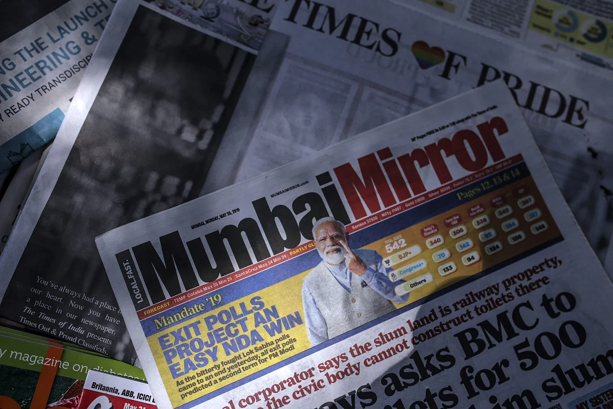 Newspapers are arranged for photograph in Mumbai, on May 20, 2019. (Photographer: Dhiraj Singh/Bloomberg)