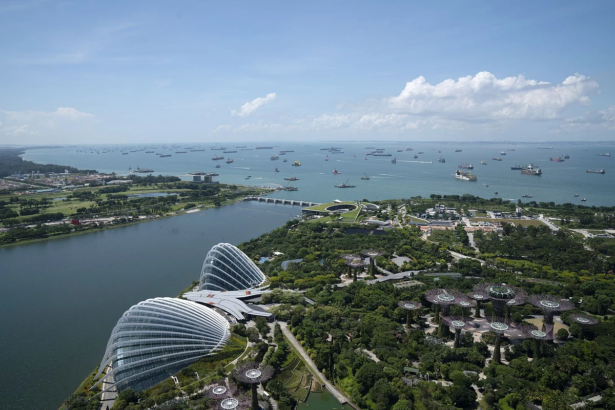 Ships are moored off the coast of Singapore on July 6. The pandemic slowed global trade while stranding seafarers caught up in port and border restrictions aimed at reducing the spread of Covid-19. Photographer: Wei Leng Tay/Bloomberg 