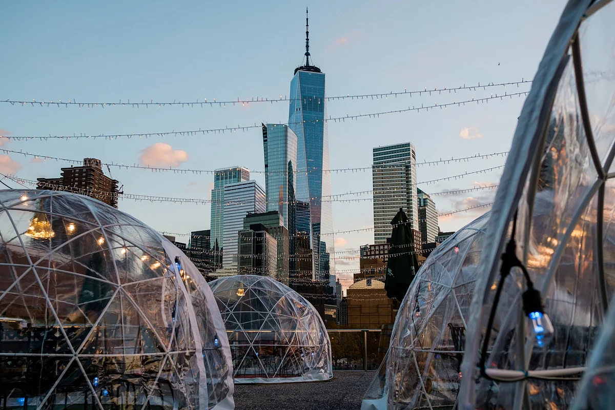 Bubble dining tents at a restaurant in New York City on Nov. 10. Restaurants scrambled to find ways to serve customers while avoiding Covid-19 transmission. Photographer: Gabriela Bhaskar/Bloomberg