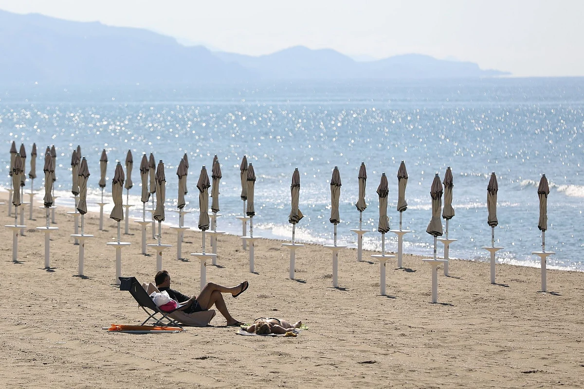 A beach in Terracina, Italy, just south or Rome, is nearly empty on May 31. Tourism across Europe was decimated by the pandemic. Photographer: Alessia Pierdomenico/Bloomberg 
