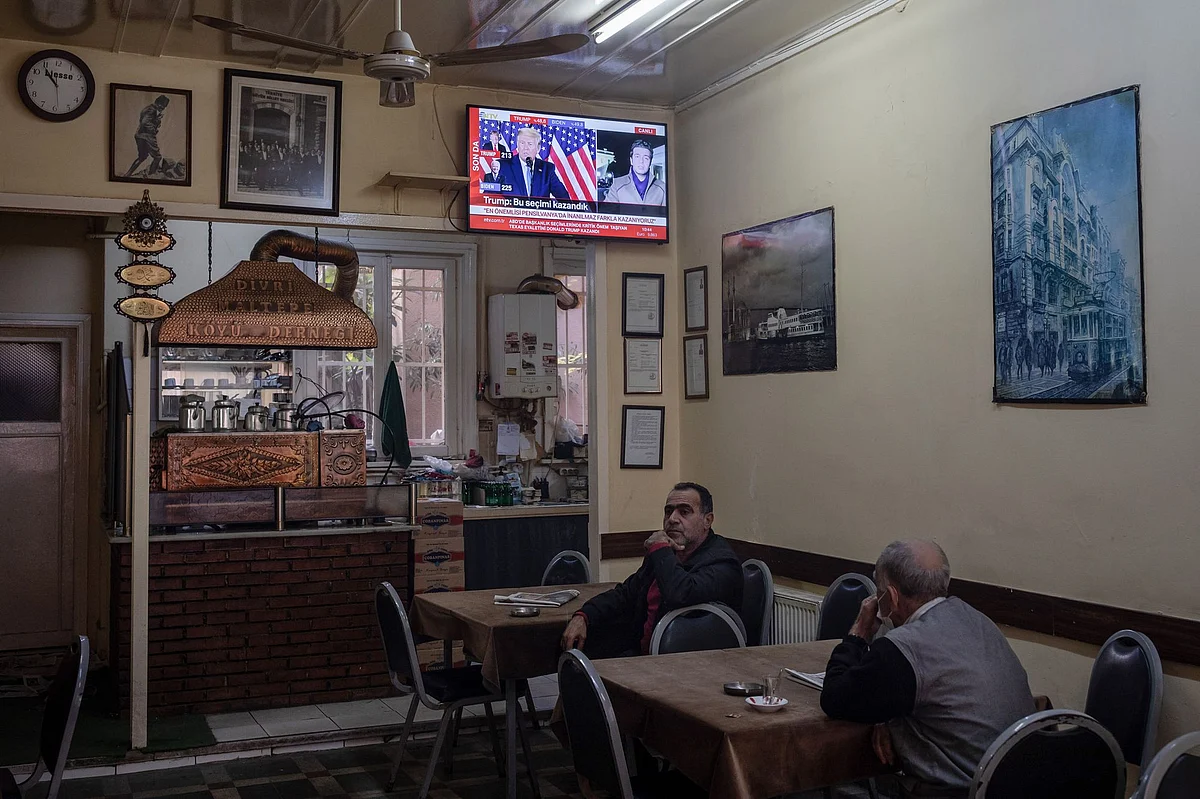 Customers at a tea house in Istanbul watch a live broadcast of a Trump news conference on Nov. 4. Photographer: Nicole Tung/Bloomberg