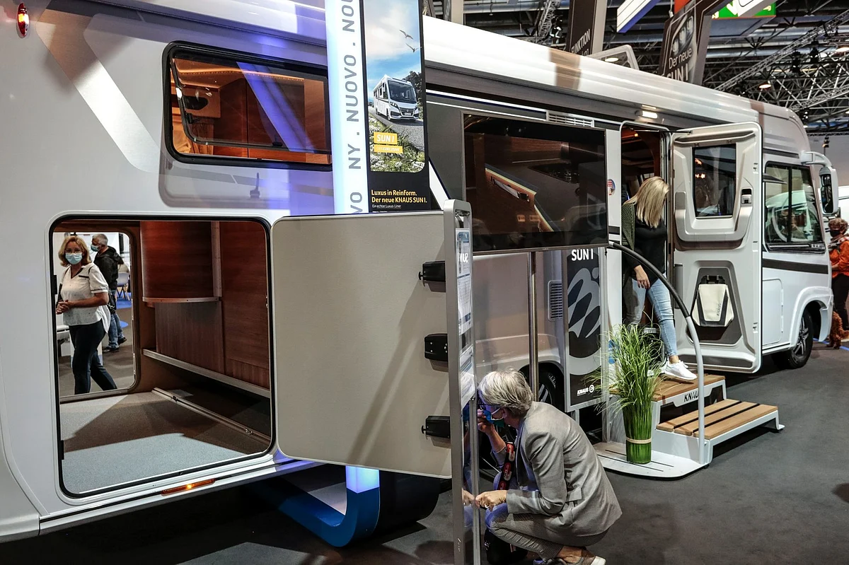 Attendees at the Caravan Salon expo in Düsseldorf, Germany, inspect a luxury motor home on Sept. 8. Recreational vehicles saw a significant uptick in sales this year as people sought to get away while staying far from crowds. Photographer: Sarah Pabst/Bloomberg