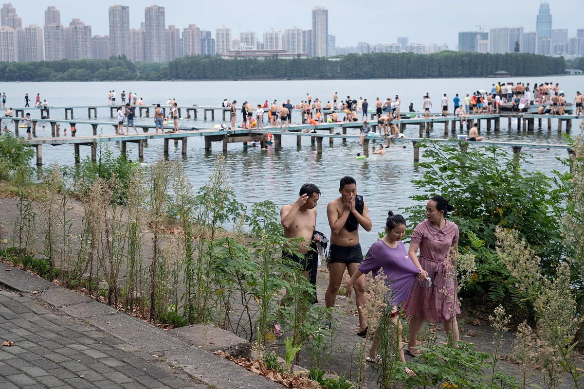 More than eight months after the novel coronavirus emerged in Wuhan, the Chinese city was moving into a post-virus future. This is Donghu Lake on Aug. 8. Photographer: Yan Cong/Bloomberg 