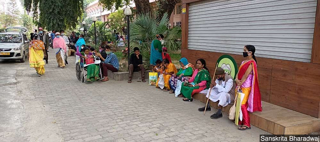 Patients and their families wait outside the Dr Bhubaneswar Borooah Cancer Institute in Guwahati, Assam, one of the oldest cancer care centres in the Northeast.