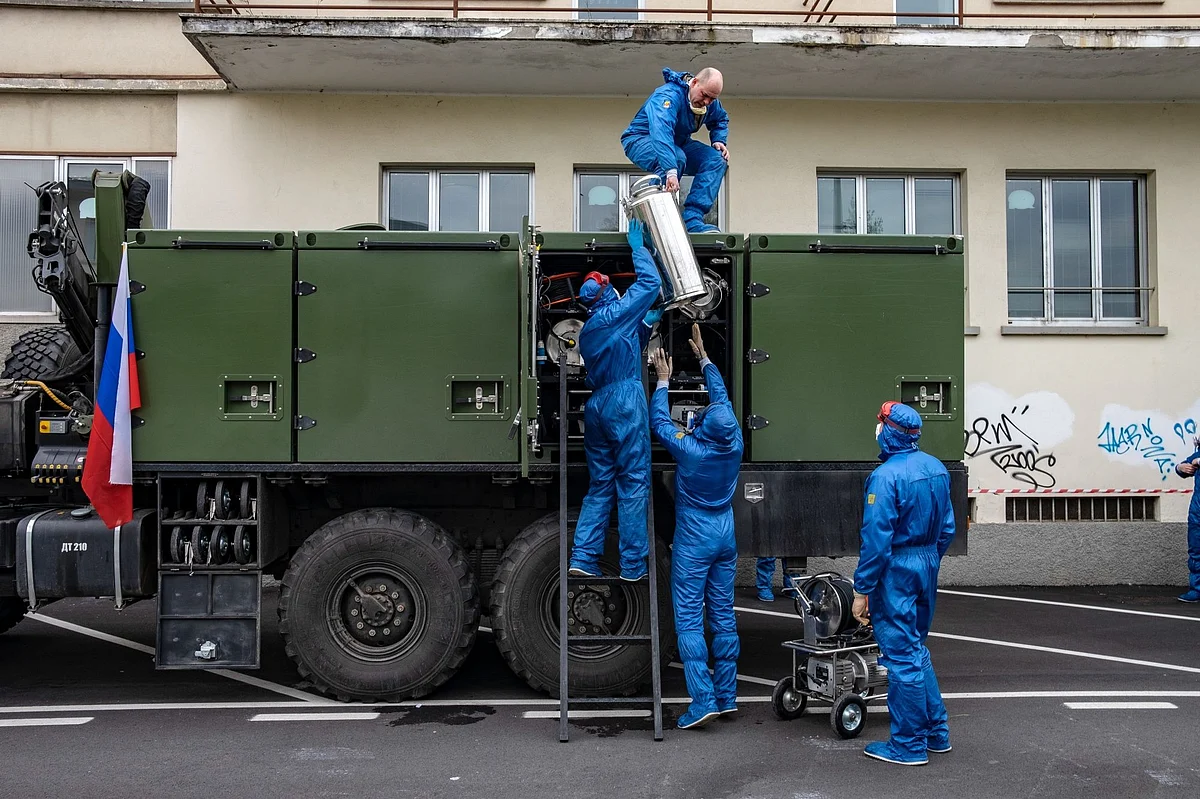 In Bergamo, Italy, Russian soldiers pack disinfection equipment at a nursing home on April 1. Italy received help from President Vladimir Putin as infections climbed in the spring. Photographer: Francesca Volpi/Bloomberg