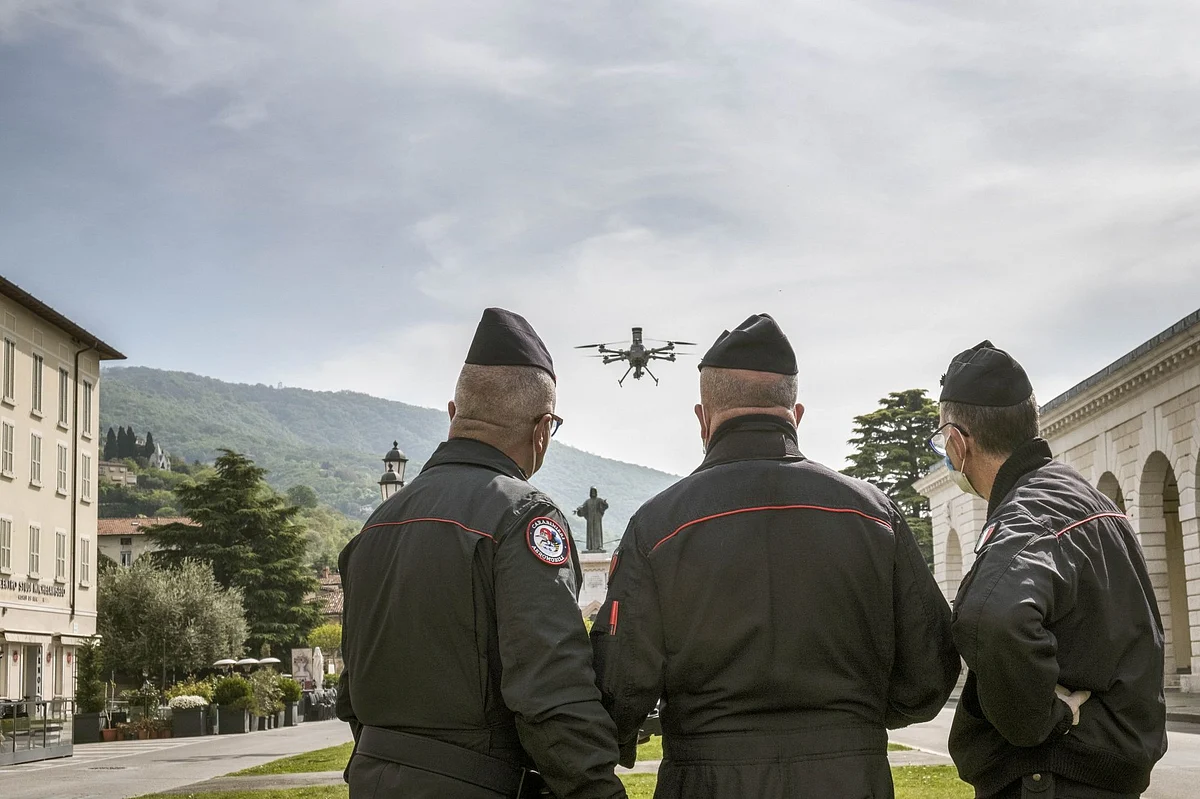 Italian officers launch a drone to monitor the lockdown in the city of Brescia on April 18. Photographer: Gianmarco Maraviglia/Bloomberg 