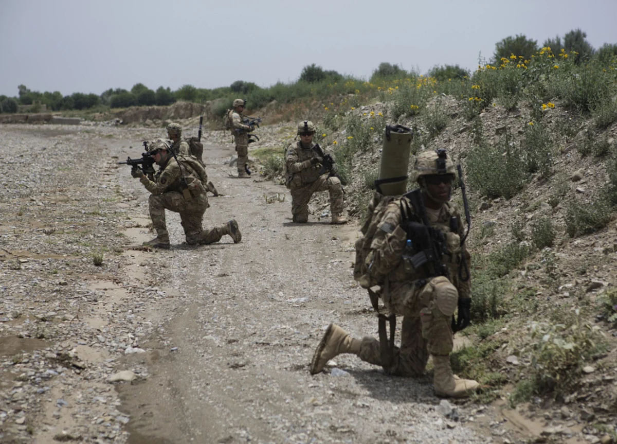 Taliban Call on Biden to Honor Trump Deal to Remove U.S. Troops