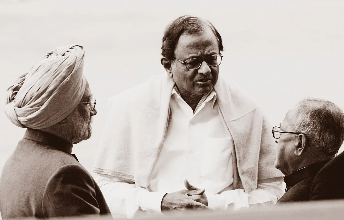 Manmohan Singh, P Chidambaram, Pranab Mukherjee, at Rashtrapati Bhavan. (Photographer: Pankaj Nangia/Bloomberg)