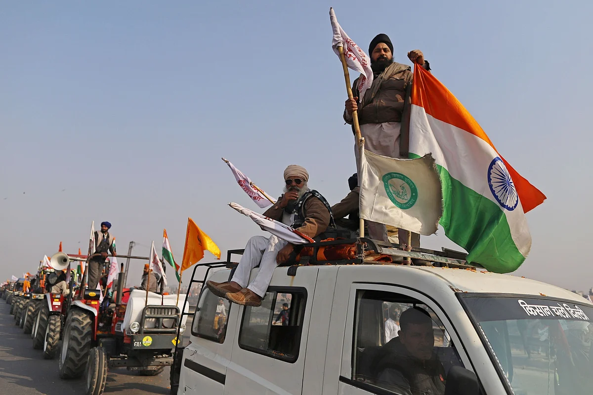 Protesting farmers are stopped at a barricade during a tractor rally near the Singhu border. (Photographer: Anindito Mukherjee/Bloomberg)