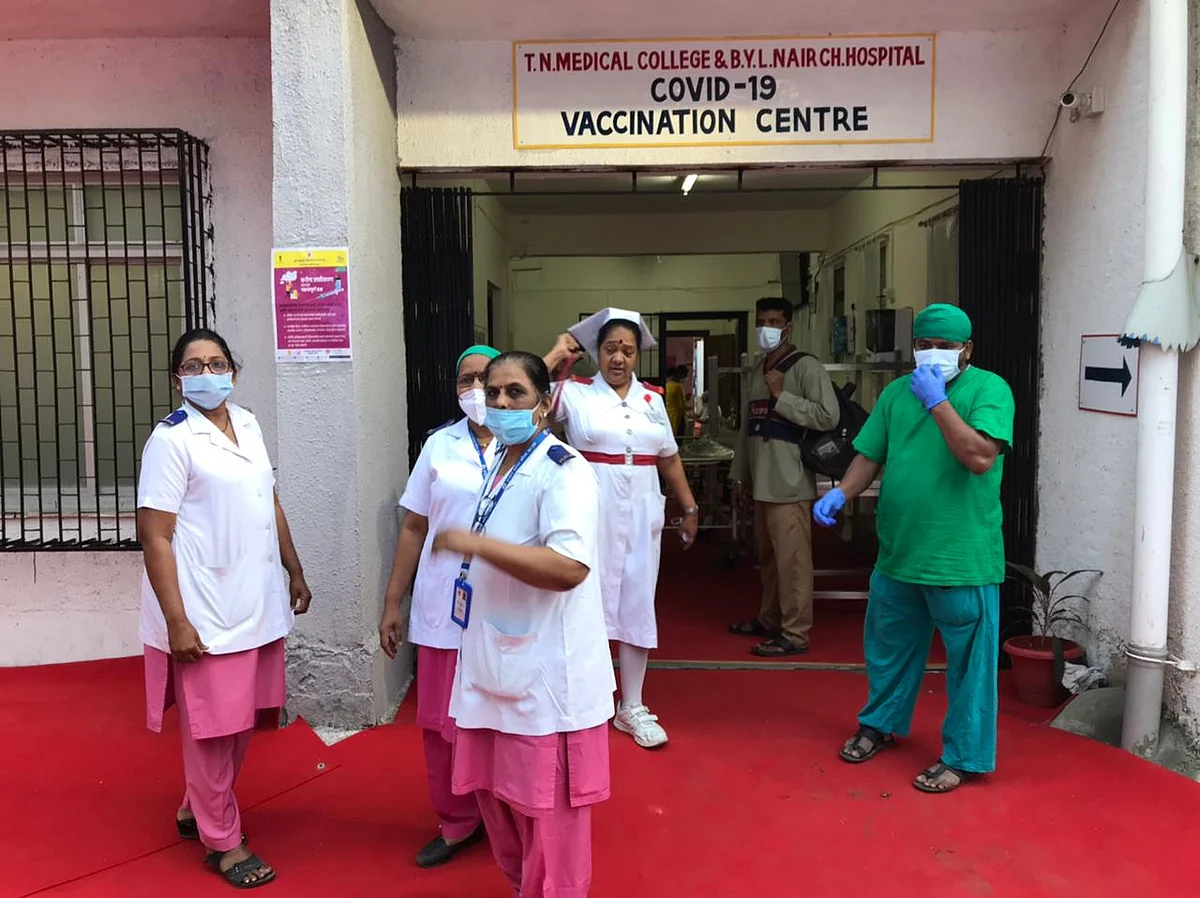 Nurses and healthcare workers at Nair Hospital, one of the designated Covid vaccination centres in Mumbai. (Photographer: Vijay Sartape/BloombergQuint)