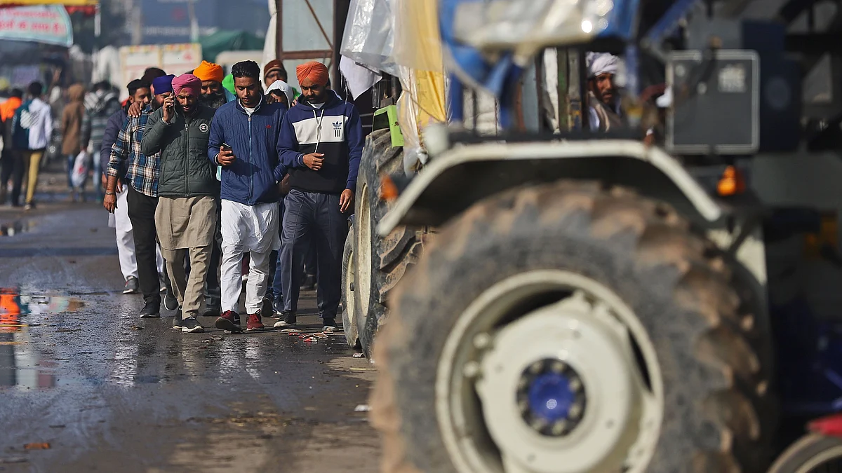 Farmers gather at a protest site on the Delhi-Haryana border crossing in Tikri. (Photographer: Anindito Mukherjee/Bloomberg)