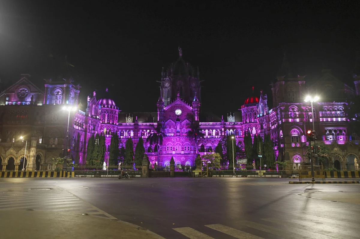 The Chhatrapati Shivaji Maharaj Terminus (CSMT) stands illuminated during a lockdown imposed due to the coronavirus at night in Mumbai, India, on Wednesday, March 25, 2020. (Photographer: Dhiraj Singh/Bloomberg)