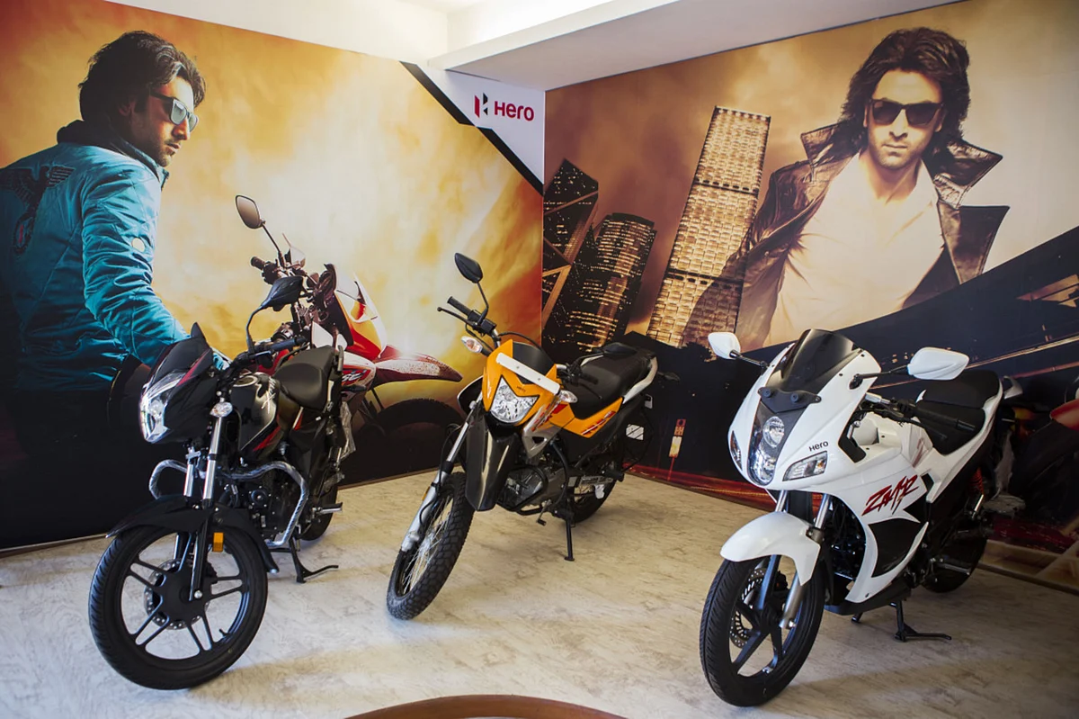 Hero MotorCorp Ltd.'s Xtreme, left, Impulse, center, and Karizma ZMR motorcycles sit on display in the reception of the company's manufacturing facility in Gurgaon, India. (Photographer: Prashanth Vishwanathan/Bloomberg)