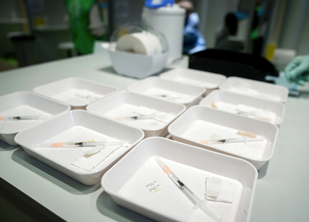 Bad Weather Slows Shots; U.S. Vaccine to Double: Virus Update