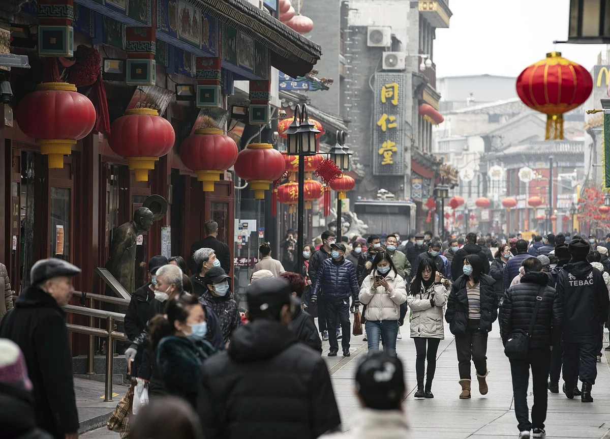China’s Modest Growth Target Signals Policy Shift From World