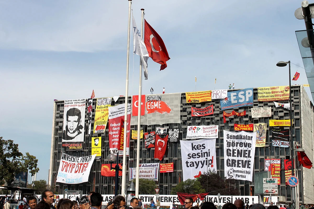 Posters protesting against Recep Tayyip Erdogan adorn a building near Taksim Square in Istanbul, Turkey, on June 6, 2013. (Photographer: Jeremy Gerard/Bloomberg)