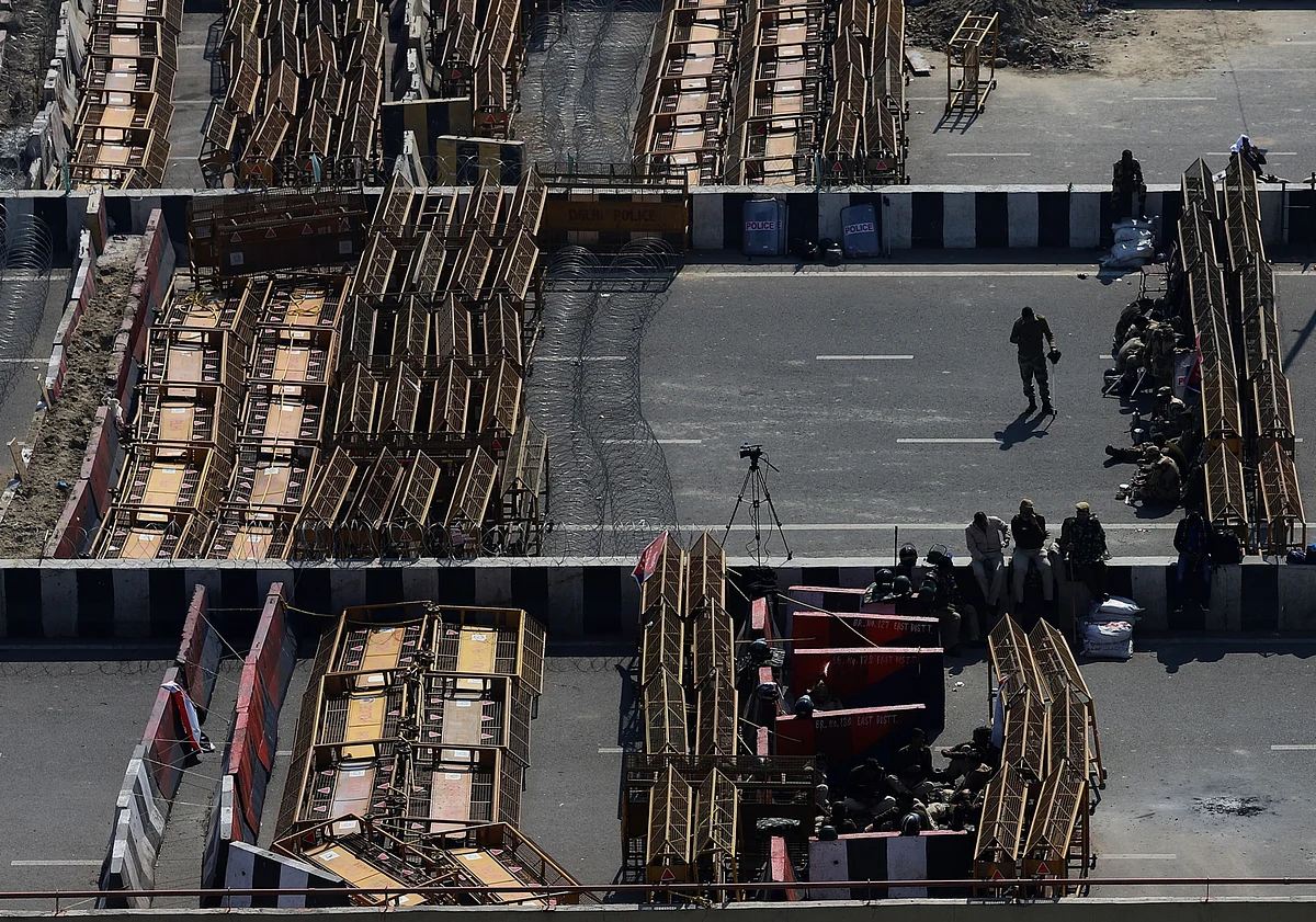 Barricades erected by the police block a highway in Ghazipur during protests by farmers against new farm laws. (Photographer: Anindito Mukherjee/Bloomberg)