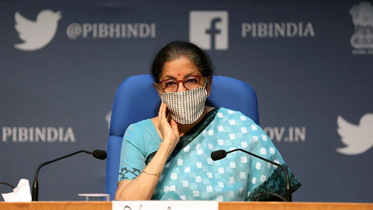 Finance Minister Nirmala Sitharaman wears a protective mask during a news conference in New Delhi, India. (Photographer: T. Narayan/Bloomberg)