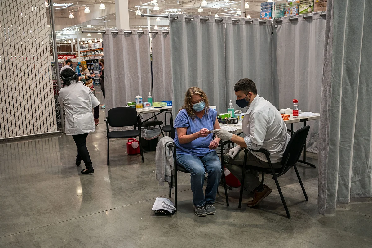 N.Y. Eases Travel Quarantine; Biden Signs Stimulus: Virus Update