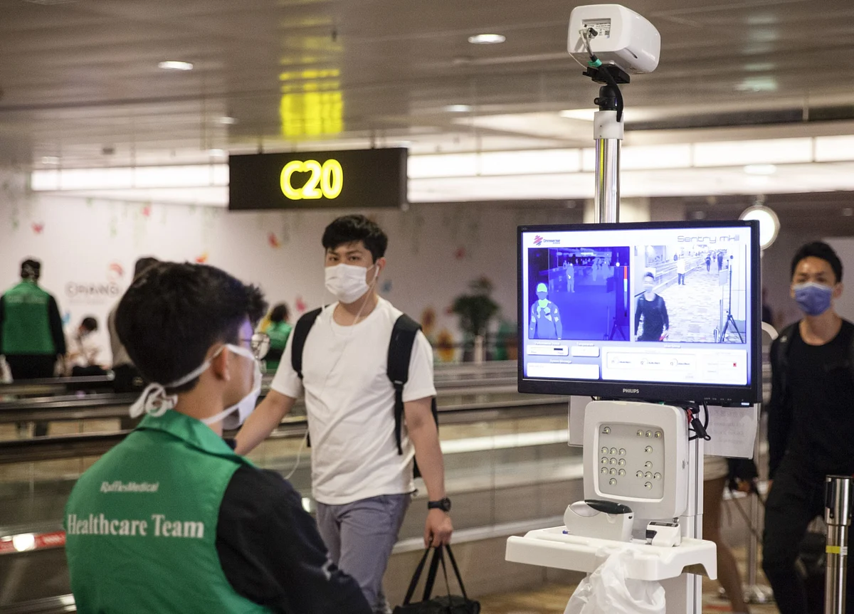 Singapore, UAE to Bar Travelers From India on Virus Threat