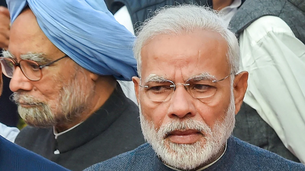 Prime Minister Narendra Modi, and former prime minister Manmohan Singh at Parliament House, in New Delhi, on Dec 6, 2018. (Photograph: PTI)