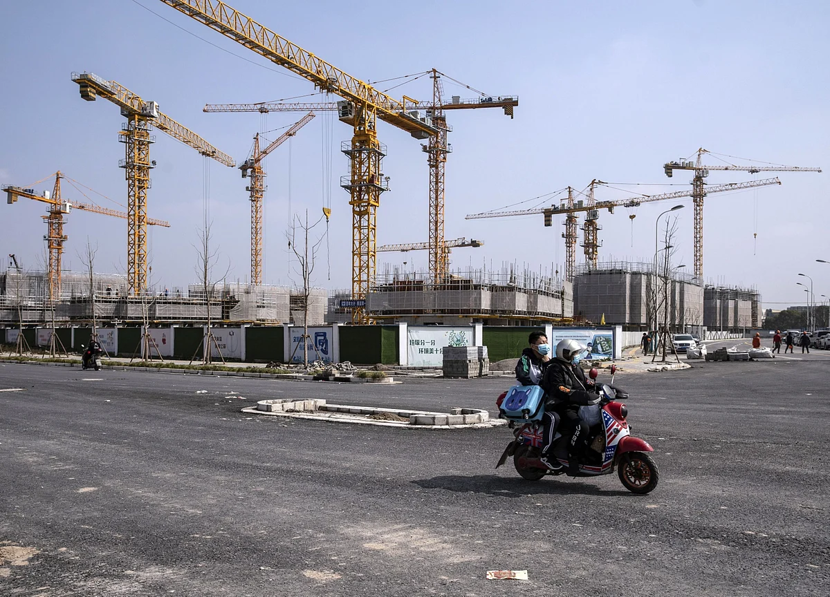 China Is Already Tapering Stimulus With Drop in Bond Sales