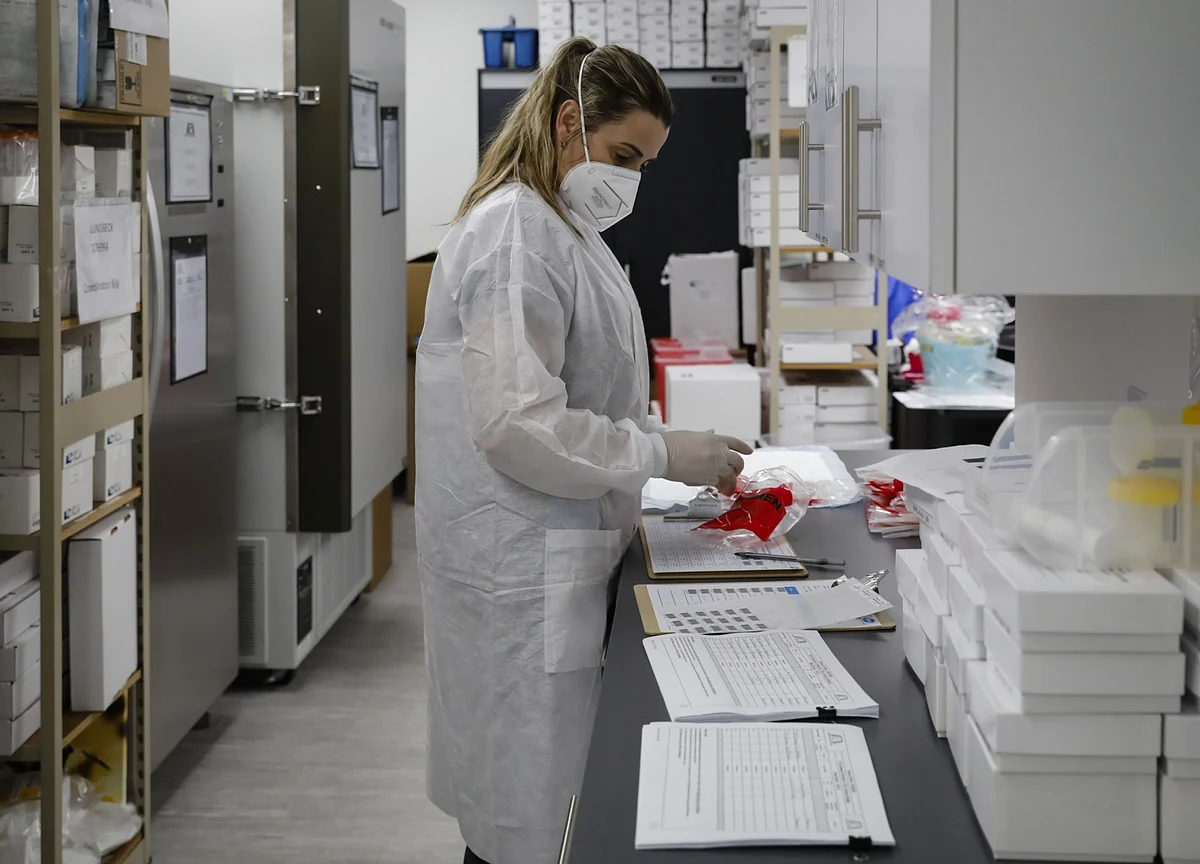 WTO Wades Into Vaccine Feud as Merkel, Pharma Balk at Biden Plan