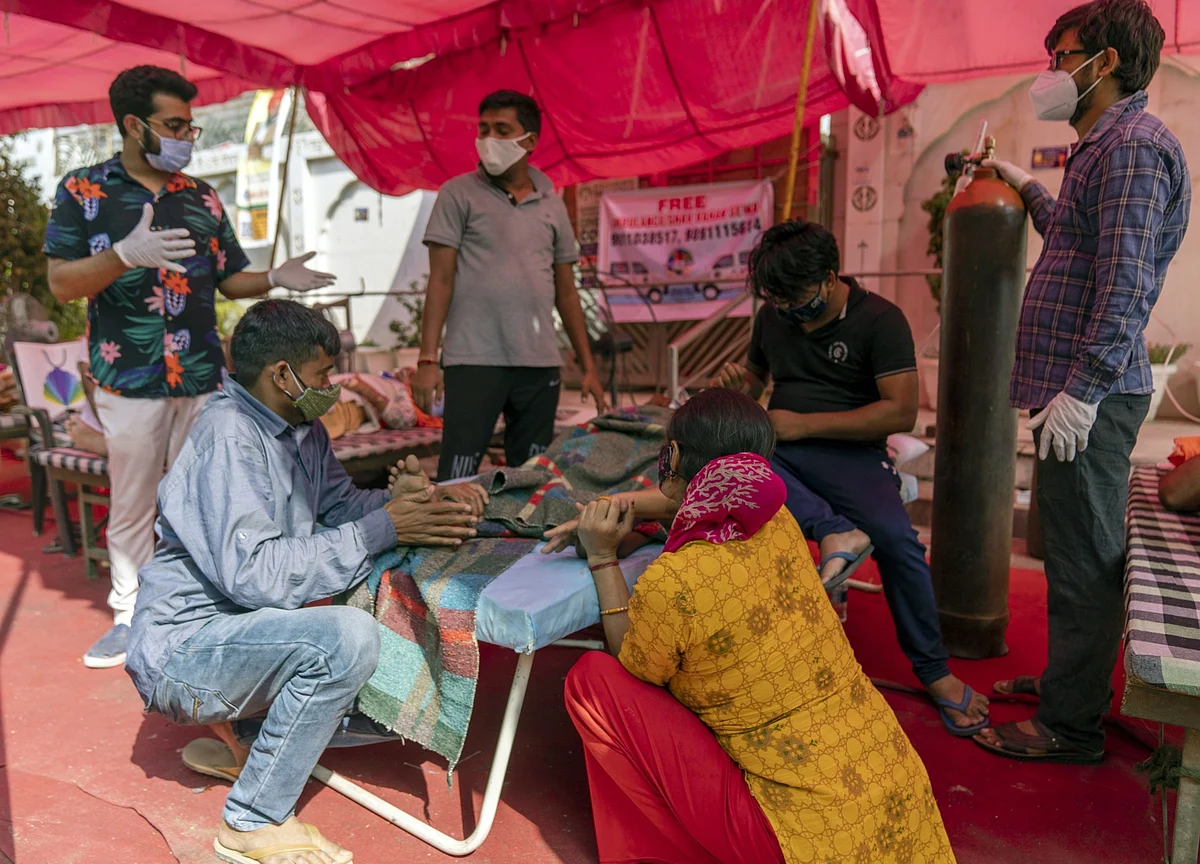India’s New Covid Cases Have Peaked, Cambridge Tracker Shows