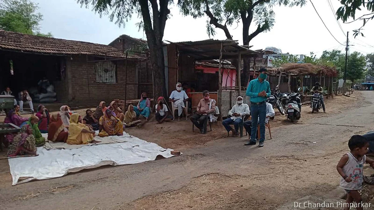 <div class="paragraphs"><p>A public meeting underway in Chinchkheda village early in May. PHC doctors, block-level officials and local political leaders led the meeting, clearing citizens' doubts regarding the vaccine.</p></div>