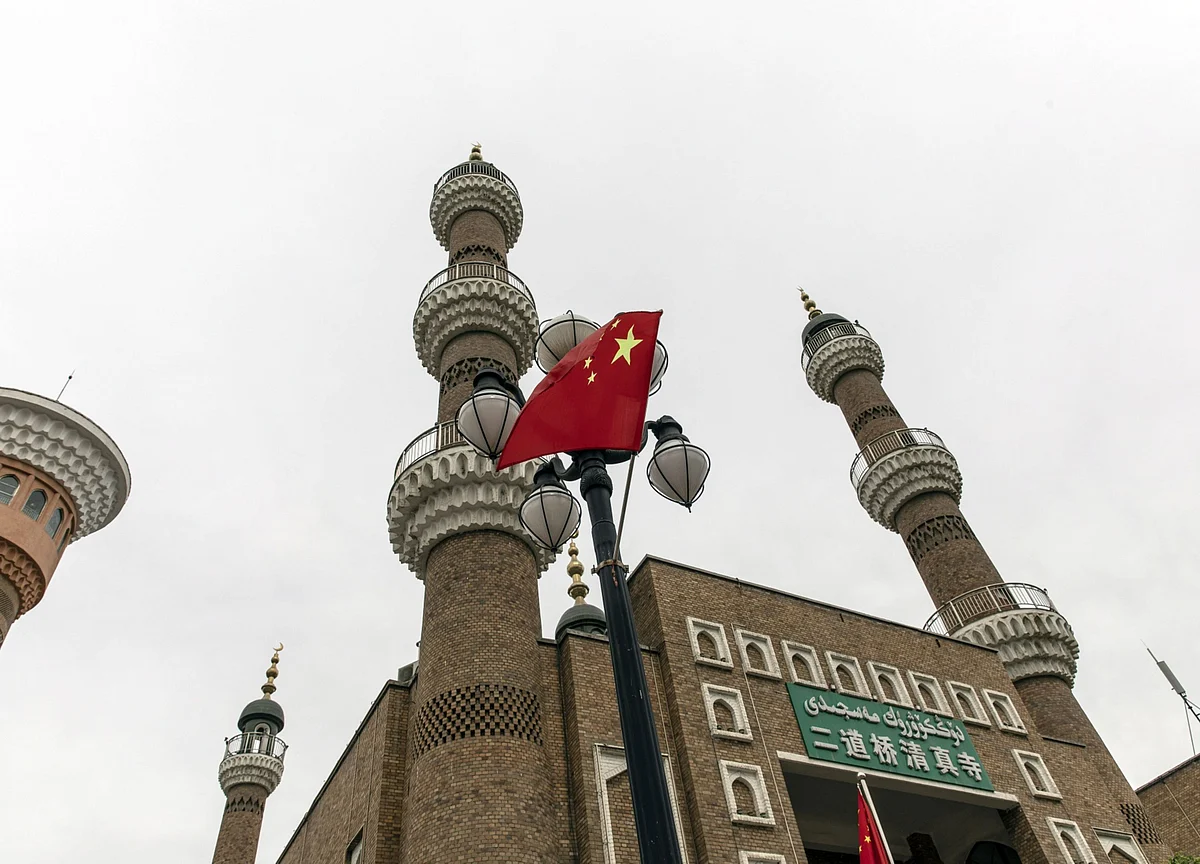 China Policies to Cut Uyghur Numbers by One-Third, Report Says