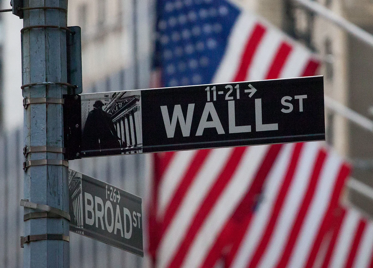 Stocks Tumble, Yield Curve Flattens Amid Fed Reset: Markets Wrap