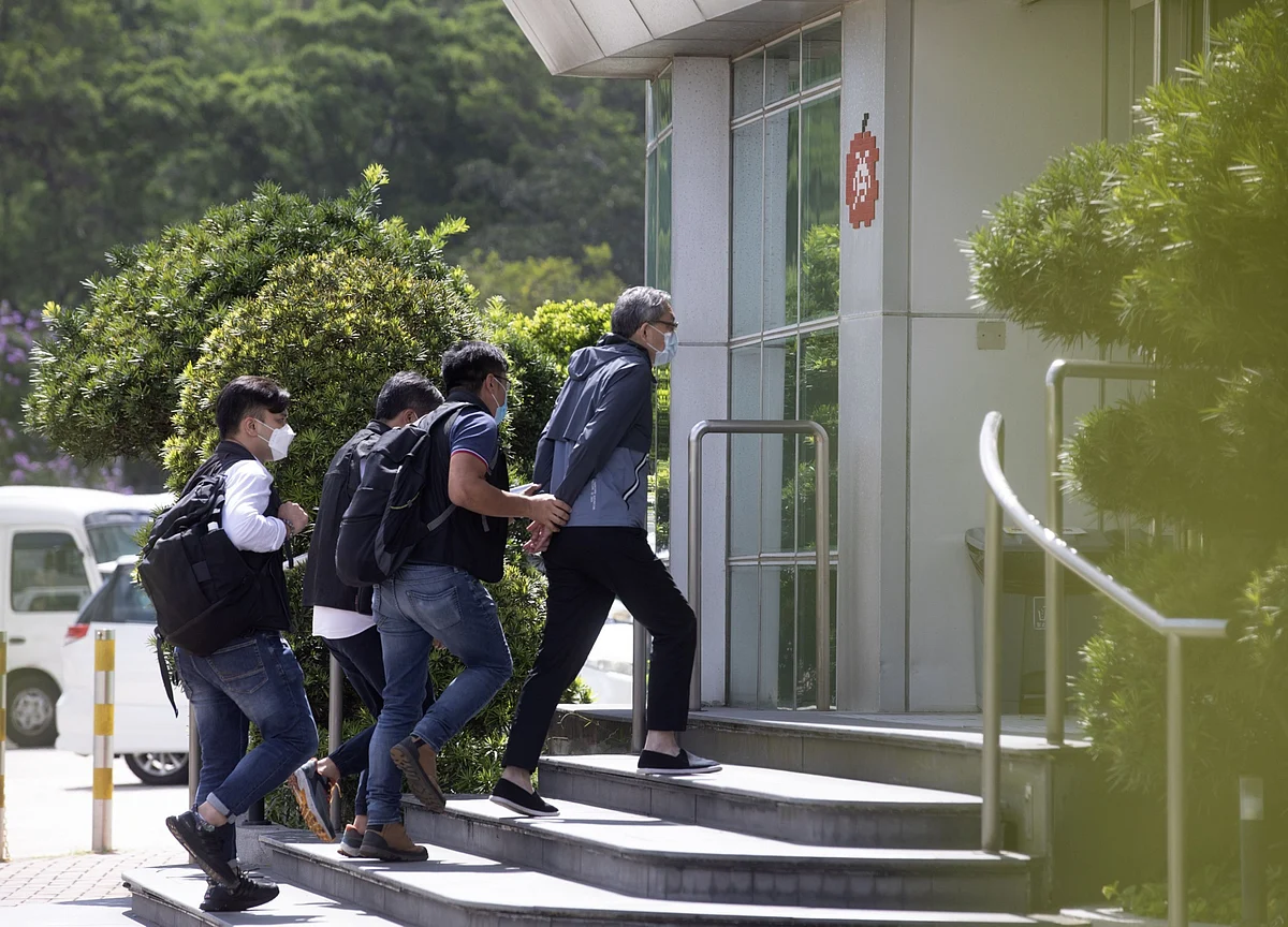 China Hails Hong Kong Journalist Arrests, Warns Media Outlets