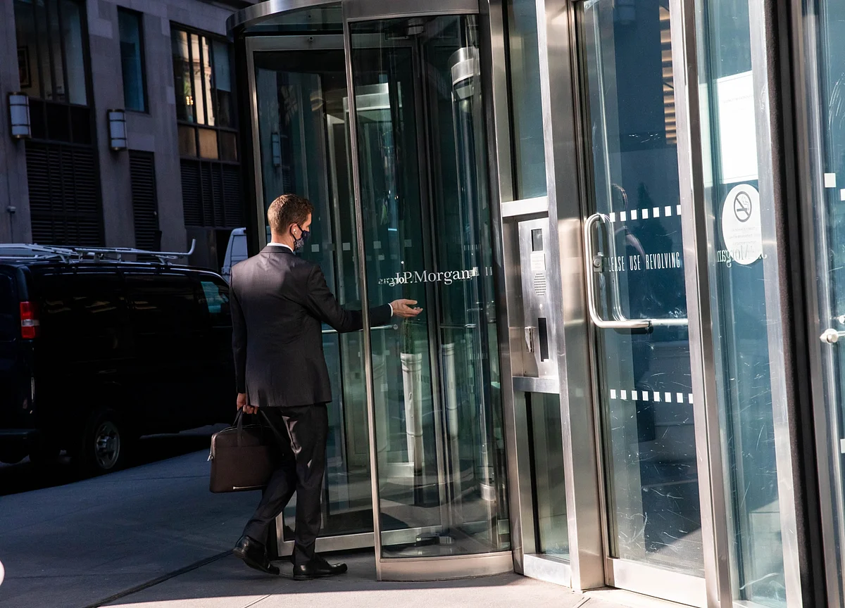 JPMorgan’s Bankers Notch Record Quarter on Merger Flurry