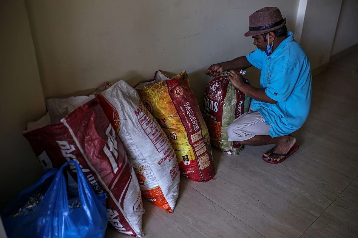 Hunger Crisis Forces Even Middle-Class Indians to Line Up for Rations