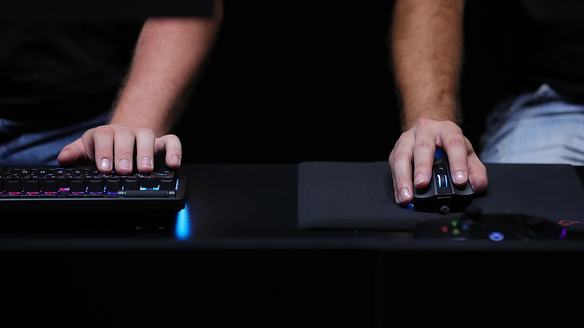 <div class="paragraphs"><p>A person uses a keyboard and a mouse to try out new computer games. (Photographer: Krisztian Bocsi/Bloomberg)</p></div>
