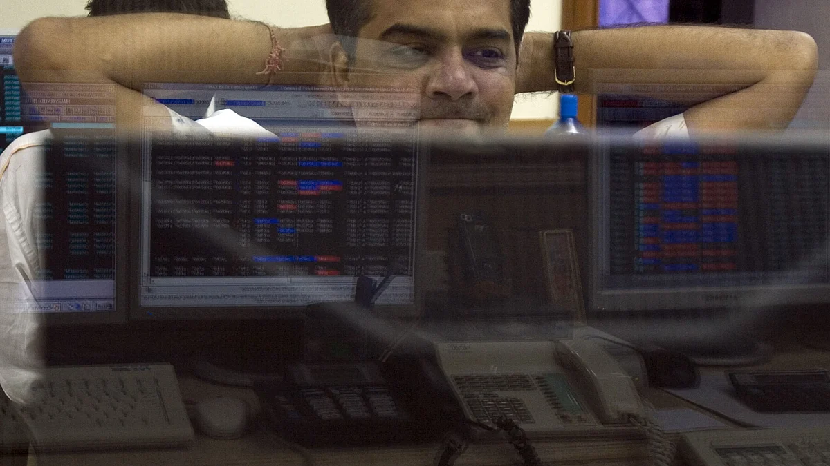 <div class="paragraphs"><p>A trader reacts while working in a brokerage house in Mumbai. (Photographer: Prashanth Vishwanathan/Bloomberg News)</p></div>