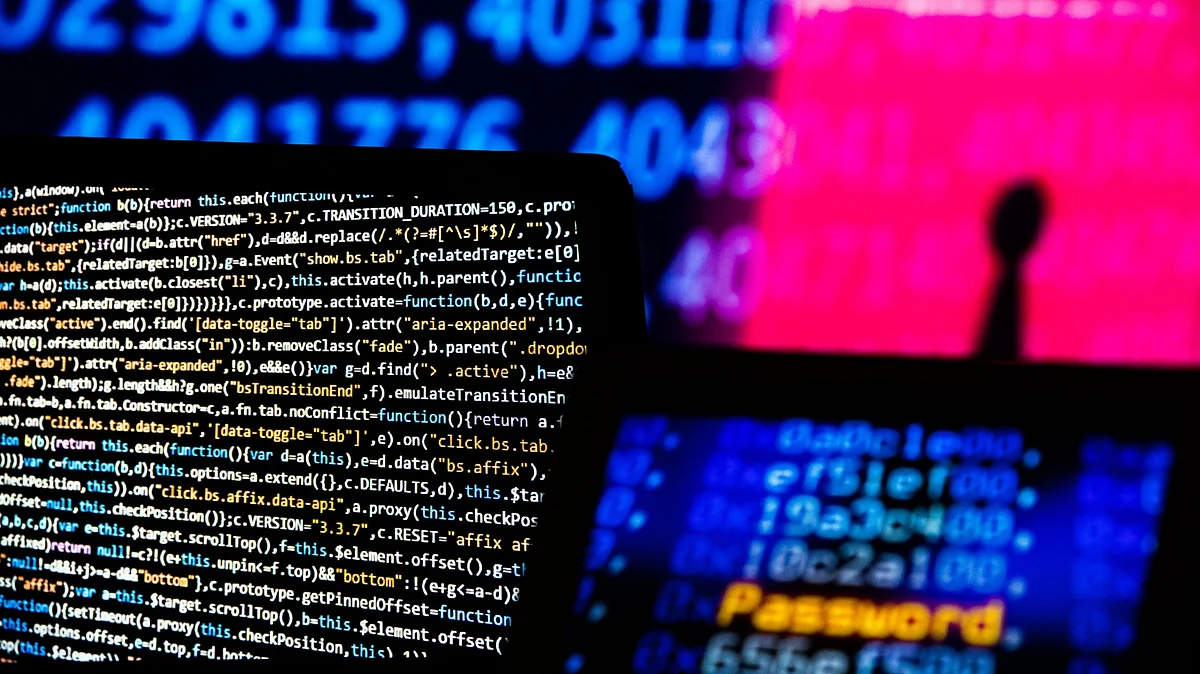 <div class="paragraphs"><p>Computer code and text displayed on computer screens. (Photographer: Chris Ratcliffe/Bloomberg)</p></div>